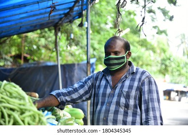 Palakkad , Kerala  / INDIA - August 28, 2020: A Street Vegetable Seller Wearing Mask Due To Corona Pandemic In Kerala. 