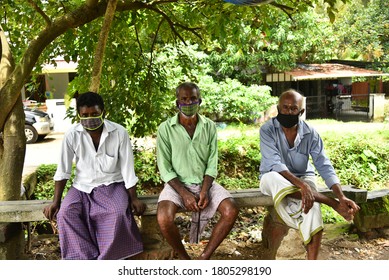 Palakkad , Kerala  / INDIA - August 30 , 2020: Three Old Men Wearing Masks Due To Corona Pandemic In Kerala. They Are Wearing Traditional Dress As Well. 