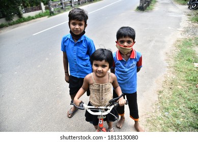 Palakkad , Kerala  / INDIA - September 11, 2020: Two Indian Boys  With Their Younger Sister. They Wears Mask Due To Corona Pandemic. 