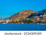 Palamidi fortress ovelooking seaside promenade at Greek town Nafplio.