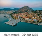 Palamidi fortress ovelooking seaside promenade at Greek town Nafplio.