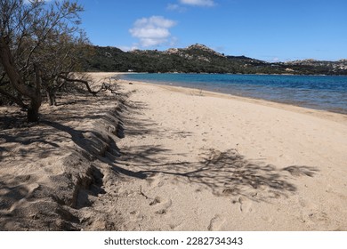 Palau is a comune in the Province of Sassari in the Italian region Sardinia, northwest of Olbia. Rocky sea coast of Italy with blue sandy beach. - Shutterstock ID 2282734343