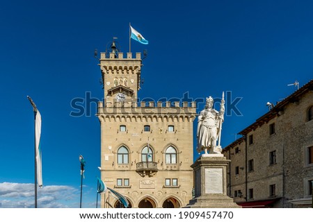 The Palazzo Pubblico and the statue of liberty in the historic center of San Marino on a sunny day