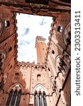 The Palazzo Pubblico, town hall is a palace located at the Piazza del Campo, the central square of Siena, Tuscany, Italy.