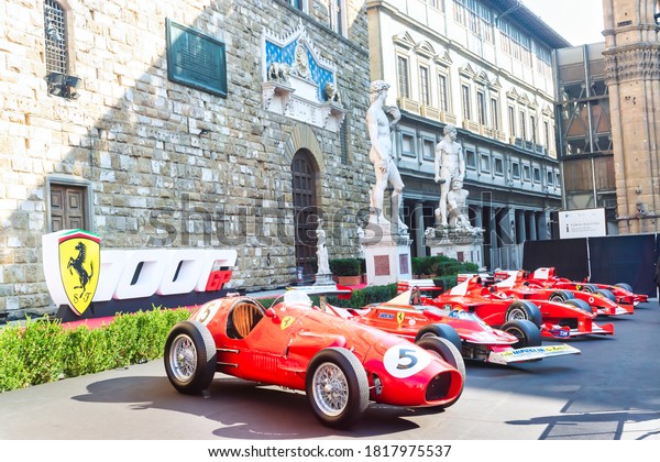 Palazzo\
Vecchio, Florence, Italy - September 12, 2020: Racing cars on\
display during Ferrari\'s 1000th Formula 1 Grand Pix. There were\
many race cars on display for the visitors to\
see