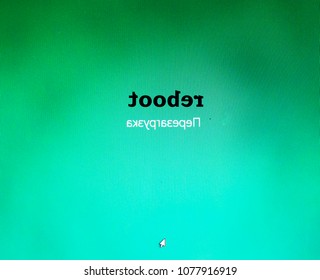 Pale green background. The cursor is on the screen. The inscription reboots both in Russian and English. - Powered by Shutterstock - Get 15% off with code: PIKWIZARD15