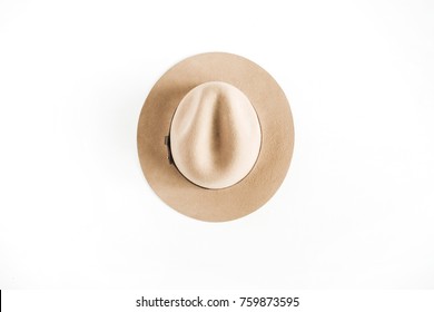 Pale Pastel Beige Hat On White Background. Flat Lay, Top View.