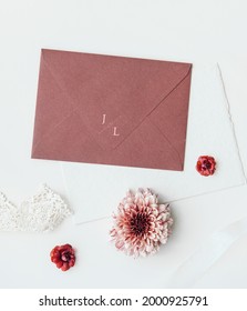 Pale Red Envelope Mockup With Flowers