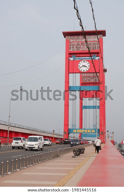 PALEMBANG, INDONESIA - 20-05-2021; In the
afternoon at the Ampera bridge and the busy traffic is full of
vehicles. Ampera bridge, South
Sumatra