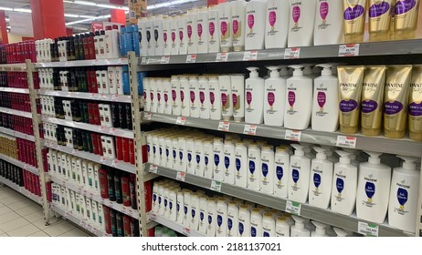 Palembang, Indonesia - July 22, 2022; Aisle View Of Various Shampoo On Supermarket Shelves.