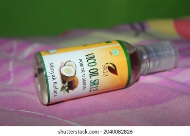 Palembang - July 1 2020: A Bottle Of Virgin Coconut Oil With Brand Of Vico Oil SR12 Produced For Health And Beauty Purpose