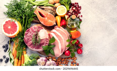 Paleo Diet Food On Light Gray Background. Healthy High Protein And Low Carbohydrate Products. Top View, Flat Lay, Copy Space