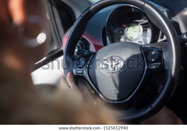 PALERMO, ITALY 8 OCTOBER 2019: Grab the car\'s\
steering wheel for driving a\
car