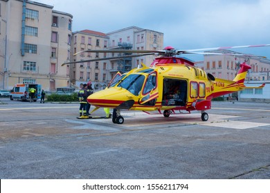 Palermo, Italy - October 24 2019: The regional emergency medical service helicopter from Messina Base arrived at the hospital heliport to unload a patient in need of special care.