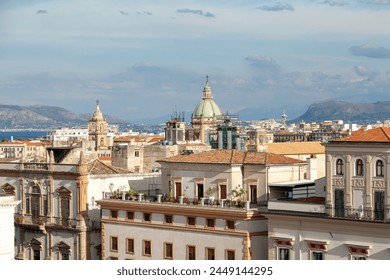 Palermo, Sicily, Italy. A panoramic view of Palermo historic rooftops with domes against the Mediterranean Sea backdrop. - Powered by Shutterstock