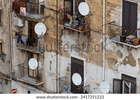 Palermo, Sicily, Italy The skyline and rooftops of Palermo and parabolic dishes.