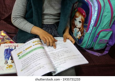 Palestinian Girl Studies Her School Meals At Her Home During The Disruption Of United Nations UNRWA Schools For Three Days A Week During The Outbreak Of The Coronavirus In Gaza Strip, On Mar 14, 2021.