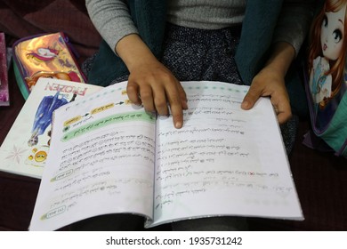 Palestinian Girl Studies Her School Meals At Her Home During The Disruption Of United Nations UNRWA Schools For Three Days A Week During The Outbreak Of The Coronavirus In Gaza Strip, On Mar 14, 2021.