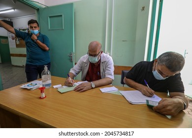 Palestinian Health Worker Takes Samples For Coronavirus At A Health Center In Rafah, In The Southern Gaza Strip, On September 22, 2021.