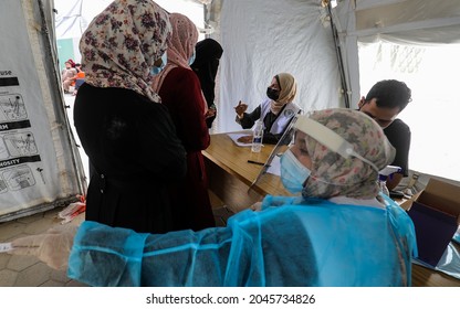 Palestinian Health Worker Takes Samples For Coronavirus At A Health Center In Rafah, In The Southern Gaza Strip, On September 22, 2021.