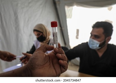 Palestinian Health Worker Takes Samples For Coronavirus At A Health Center In Rafah, In The Southern Gaza Strip, On September 22, 2021.