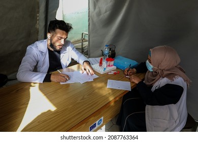 Palestinian Health Worker Takes Samples For Coronavirus Of Covid-19 At A Health Center In Rafah, In The Southern Gaza Strip, On December 8, 2021.