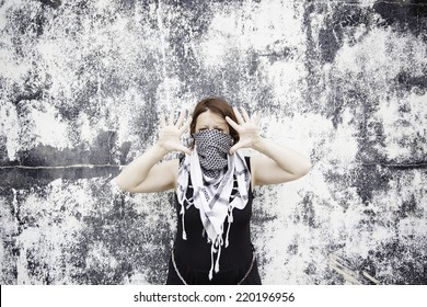 Palestinian Woman With Scarf On Urban Street