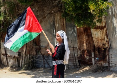 Palestinians Participate During The Revival Of Heritage Event On The Occasion Of World Refugee Day Next Sunday In The Maghazi Refugee Camp In The Central Gaza Strip, On July 1, 2021.