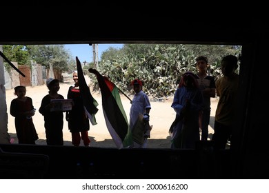 Palestinians Participate During The Revival Of Heritage Event On The Occasion Of World Refugee Day Next Sunday In The Maghazi Refugee Camp In The Central Gaza Strip, On July 1, 2021.