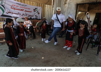 Palestinians Participate During The Revival Of Heritage Event On The Occasion Of World Refugee Day Next Sunday In The Maghazi Refugee Camp In The Central Gaza Strip, On July 1, 2021.