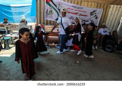 Palestinians Participate During The Revival Of Heritage Event On The Occasion Of World Refugee Day Next Sunday In The Maghazi Refugee Camp In The Central Gaza Strip, On July 1, 2021.