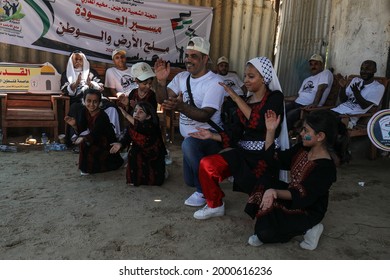 Palestinians Participate During The Revival Of Heritage Event On The Occasion Of World Refugee Day Next Sunday In The Maghazi Refugee Camp In The Central Gaza Strip, On July 1, 2021.