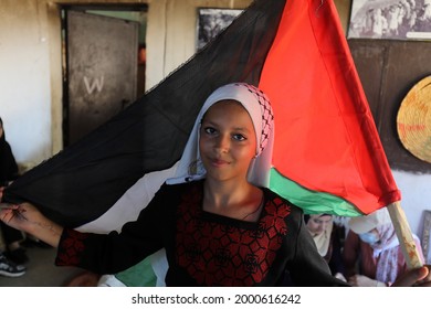 Palestinians Participate During The Revival Of Heritage Event On The Occasion Of World Refugee Day Next Sunday In The Maghazi Refugee Camp In The Central Gaza Strip, On July 1, 2021.