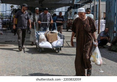 Palestinians Receive Their Food At The Aid Distribution Centre Run By The United Nations Relief And Works Agency (UNRWA) In The Southern Gaza Strip Refugee Camp Of Rafah, On September 16, 2022.