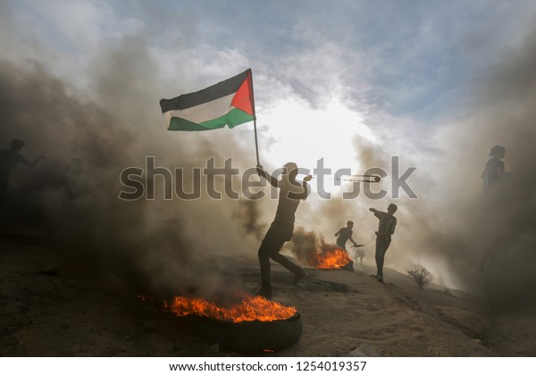 Palestinians take part in a \