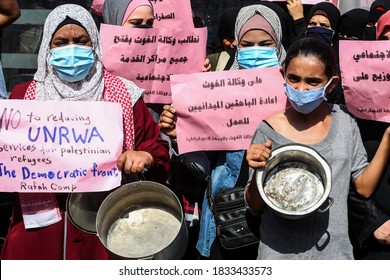 Palestinians Take Part In A March To Protest The Reduction Of The Food Basket Provided By The United Nations Relief And Works Agency For Palestine Refugees (UNRWA) In Gaza Strip, On Oct 14, 2020. 