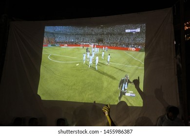 Palestinians watching a match between Algeria and Senegal African Cup final the 2019, in  Rafah in the southern Gaza Strip, on July 19, 2019. Photo by Abed Rahim Khatib - Shutterstock ID 1455986387