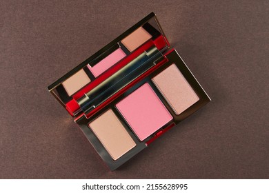 Palette Of Contouring Products For The Face On A Brown Background, Blush, Bronzer