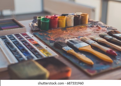 Palette with oil paints and gouache set. Clean painter workplace ready for drawing. - Powered by Shutterstock