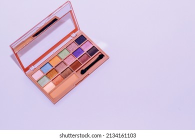 A palette shimmery eyeshadows in different colors 