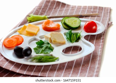 Palette With Tasty Colorful Vegetables, Fish And Greens, Creative Food Design, Funny And Healthy Meal For Kids. 