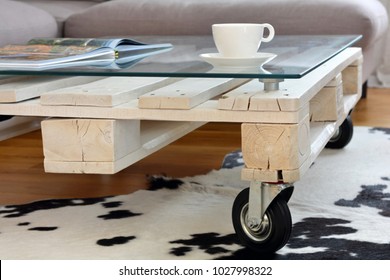 pallet coffee table - a contemporary interior detail - Powered by Shutterstock