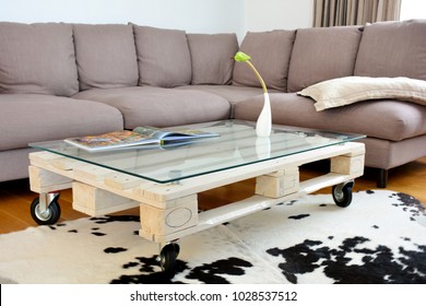 pallet coffee table - a contemporary interior detail - Powered by Shutterstock