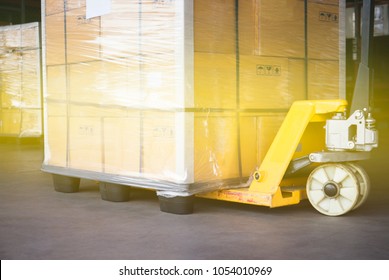 Pallet Goods With Manual Forklift, Transport By Truck.