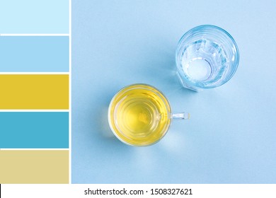 Pallete Of Colors Glass Of Water, Cup Of Green Tea On Blue Table Top View Flat Lay Style Life Beverages, Drink And Lose Weight Concept Harmonious Combination Of Colors. Color Theory And Mixing.