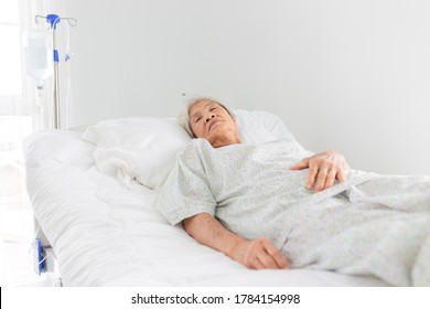 Palliative Care,  Old Asian Patient Sleep On White Bed, She Feeling Lonely, Necklace Old Female, Mother's Day, Elderly Healthcare Promotion