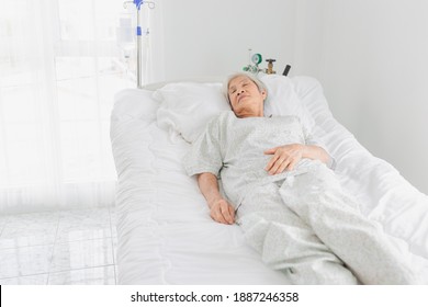 Palliative Care,  Old Asian Patient Sleep On White Bed, She Feeling Lonely, Necklace Old Female, Mother's Day, Elderly Healthcare Promotion