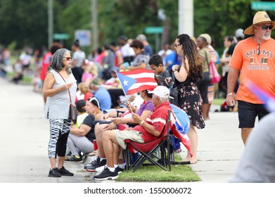 PALM BAY, FL - USA- NOVEMBER 3 2019: Part Of The Public Who Attended The Puerto Rican Parade In Palm Bay Wait In The Street Minutes Before The Start Of The Parade.