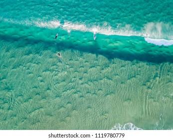 Palm Beach and Currumbin aerial view of surfers in the ocean on the Gold Coast in Queensland, Australia