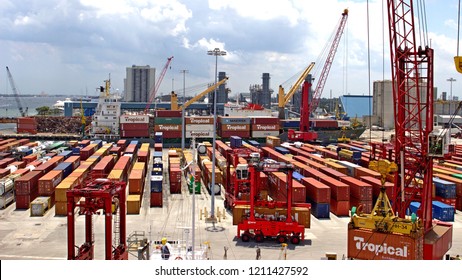 Palm Beach, Florida, U.S.A. - 04/24/2018. The Container Port With Lines Of Containers Waiting For The Cranes To Send Them On Their Way.
